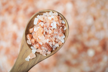 Flat lay Pink Salt in Wooden Spoon