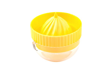 One yellow plastic juicer with transparent tank for make fresh natural juice from different fruits and vegetables isolated on white