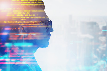 Man in glasses in city, programming concept