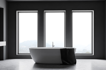 Fototapeta na wymiar Loft gray bathroom interior with tub