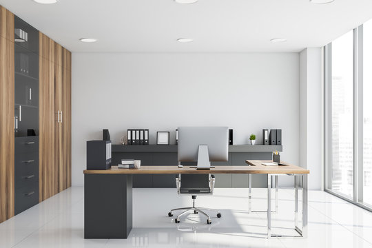 White and wooden CEO office interior