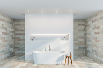 Fototapeta na wymiar White and stone bathroom interior with tub