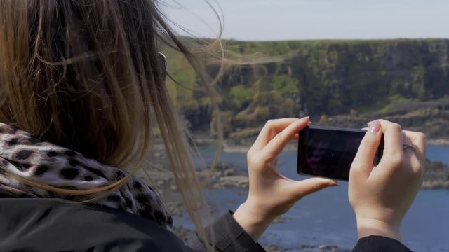 Taking photos at Giants Causeway Coast in Northern Ireland - travel photography