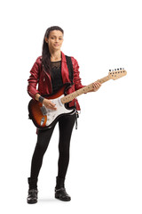Young female with an electric guitar posing