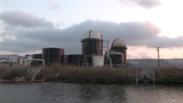 Petroleum tanks on the bank of the Kishon River Sailing shot, Petroleum tanks on the bank of the Kishon River Haifa Israel