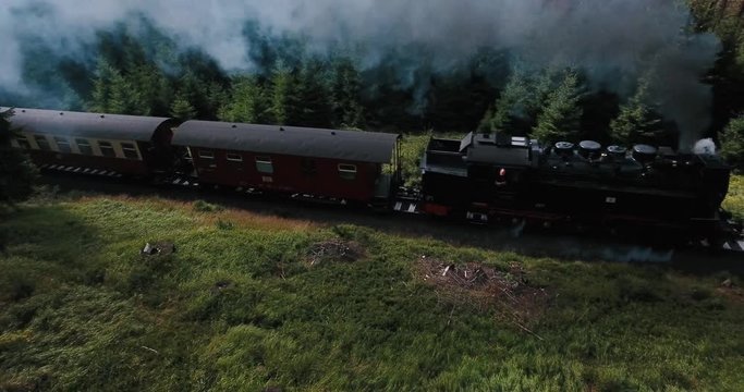 We took this shot of a historic steam train in the landscape of "Harz Nationalpark" where these trains can be seen often.