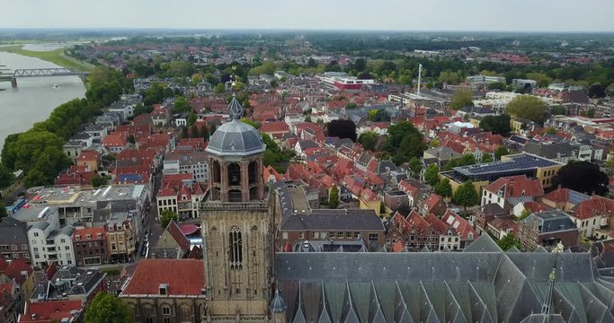 flying over a big church in a city