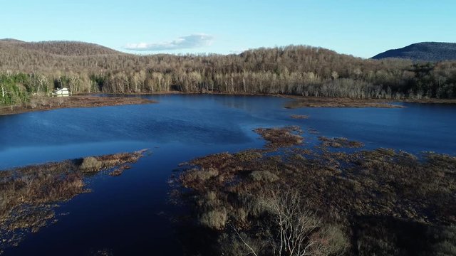 Aerial, rural lake in Adirondack Mountains