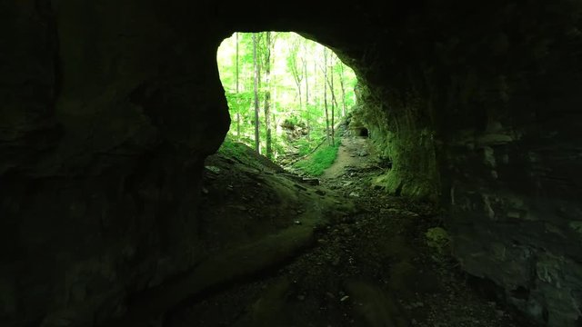Aerial, dark cave in Carter Cave State Park