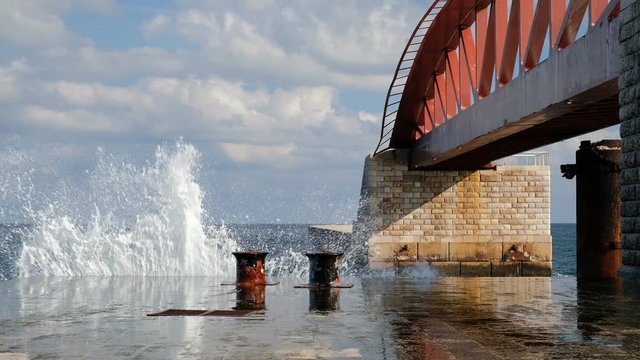 St Elmo bridge with waves