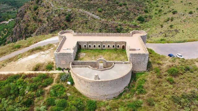 Aerial drone video of famous Ottoman fortified castle of Koule near ancient city of Aptera, Chania, Crete island