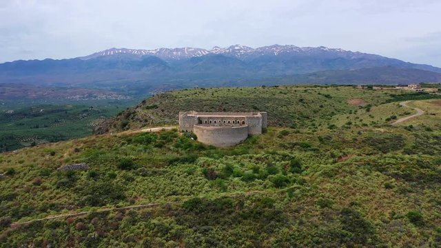 Aerial drone video of famous Ottoman fortified castle of Koule near ancient city of Aptera, Chania, Crete island