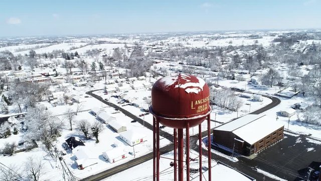 Lancaster water tower covered in snow, aerial