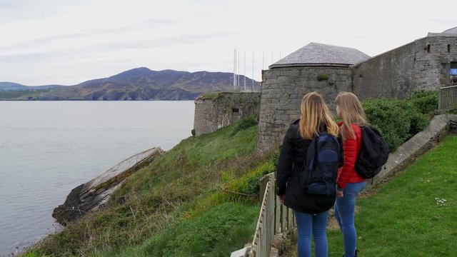 Two young women visit Fort Dunree in Ireland - travel photography
