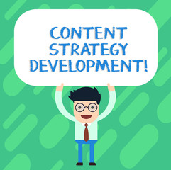 Handwriting text Content Strategy Development. Concept meaning setting some goals for the marketing content Man Standing Holding Above his Head Blank Rectangular Colored Board
