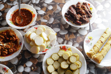 Malaysian local traditional food, lemang, ketupat, ketupat palas and other eat during eid mubarak or known as Hari Raya Aidilfitri celebration. Eat together with curry or rendang.