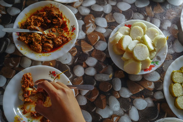Malaysian local traditional food, lemang, ketupat, ketupat palas and other eat during eid mubarak or known as Hari Raya Aidilfitri celebration. Eat together with curry or rendang.