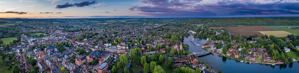 Dramatic aerial panoramic view of the beautiful town of Marlow in Buckinghamshire UK, captured after a rain storm at dusk