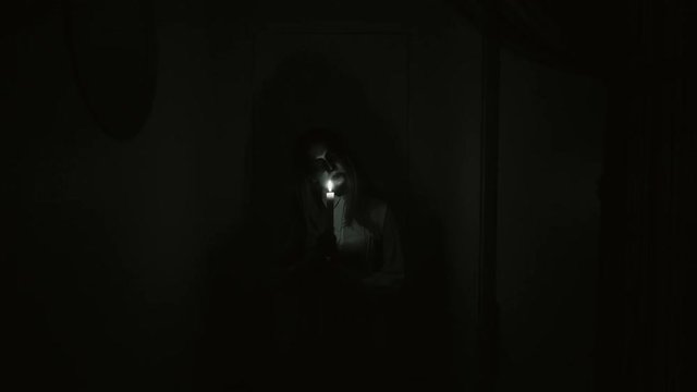 Creepy POV nightmare. A man enters dark hallway and encounters a monster with candle. Whenever he turn on the light, a monster invisible. Whenever he turn off the light a monster getting closer.