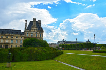 PARIS, FRANCE - MAY, 2019:  Jardin des Tuileries, Tuileries Garden and Tuileries Palace . Garden was created by Catherine de Medici in 1564