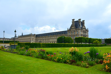 PARIS, FRANCE - MAY, 2019:  Jardin des Tuileries, Tuileries Garden and Tuileries Palace . Garden was created by Catherine de Medici in 1564