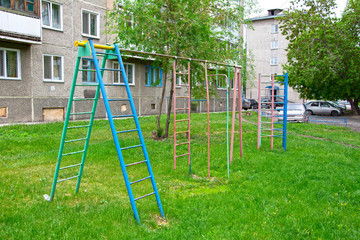 Abandoned sports playground, in the usual courtyard of an apartment building.