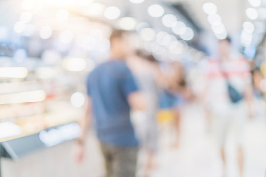 abstract blur image background of people shopping at department mall