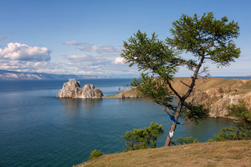 Fototapeta na wymiar Rock Shaman Stone and cape Burhan on Olkhon Island, lake Baikal