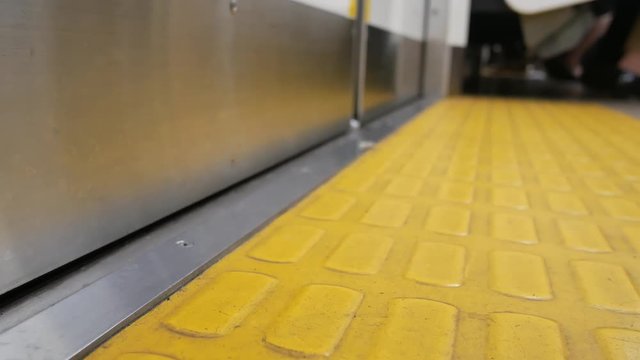 Zooming In To The Train Door In Upper View While The Door Is Closing 