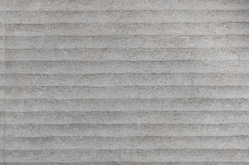 Textured rough cement wall pattern interior design for building architect.
