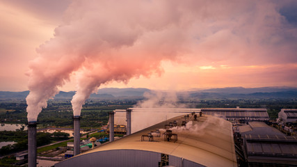 Smokestack pipe factory pollution in the city, Fuel Power Plant Smokestacks Emit Carbon Dioxide...