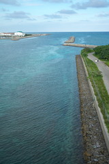 Okinawa,Japan-May 30, 2019: Tonoshiro fishing port or harbor viewed from the southern gate bridge in the afternoon in Ishigaki, Okinawa