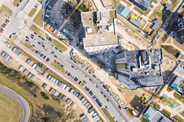 new residential area under construction. aerial top view of construction site with unfinished buildings