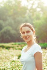beautiful girl in the sun on the street