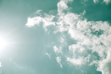 blue sky with clouds and sun. blue sky and clouds. tree and blue sky. blue sky with white clouds