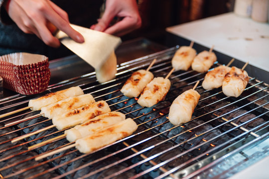 Grilled Cheese Sticks On Gas Griller Stove, Street Food At Ximending In Taiwan, Taipei.