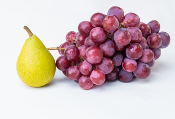 pears and grapes isolated on white background. Contrast of colors. Natural fruits.