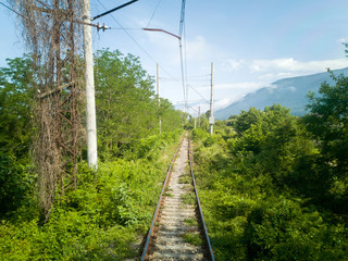 Railroad through the mountains. Wild path for train in Abkhazia.