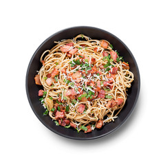 Carbonara pasta, spaghetti with bacon, egg, hard parmesan cheese and cream sauce isolated on white background.
