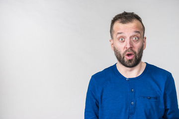 Astonished shocked adult man