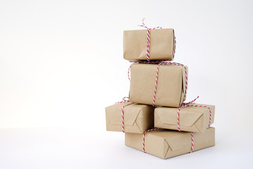 Christmas presents laid on a white table background