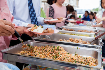 Food Buffet Catering Dining Eating Party Sharing Concept.people group catering buffet food indoor in luxury restaurant with meat colorful fruits and vegetables
