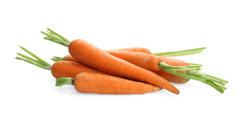 Fresh ripe carrots on white background. Wholesome vegetable