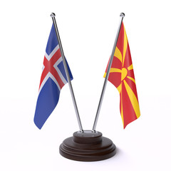 Iceland and Macedonia, two table flags isolated on white background. 3d image