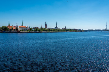 Fototapeta premium Cityscape of River and Riga Latvia on a Clear Sunny Day