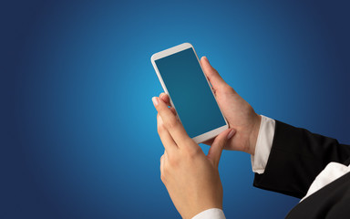 Mockup for female hand using frameless smartphone with dark background
