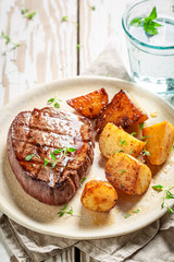 Fresh and tasty steak with roasted potatoes