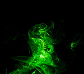 Green smoke on black background