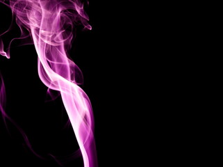 Obraz premium Purple smoke on black background