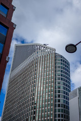 Obraz premium Den Haag, Netherlands, , Canada Place, LOW ANGLE VIEW OF MODERN BUILDINGS AGAINST SKY